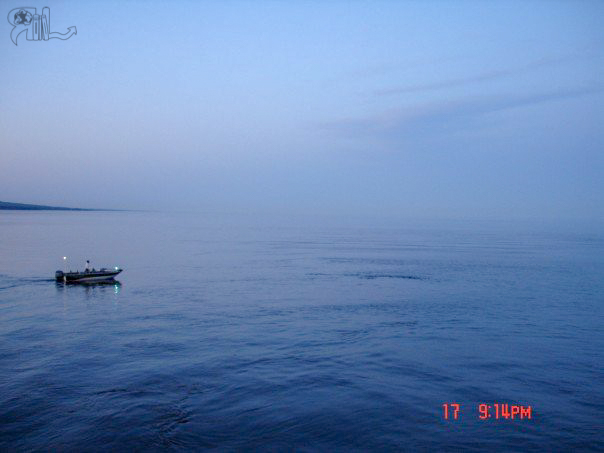 A boat and massive Lake Superior.