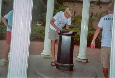 Miller drinking from "The Well" at UNC.